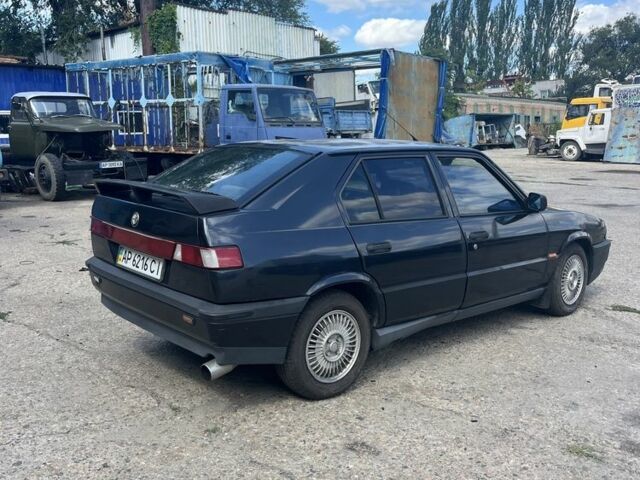 Черный Альфа 145, объемом двигателя 1.4 л и пробегом 250 тыс. км за 848 $, фото 2 на Automoto.ua