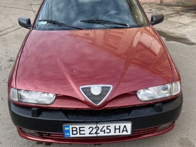 Красный Альфа 146, объемом двигателя 1.6 л и пробегом 218 тыс. км за 1750 $, фото 1 на Automoto.ua