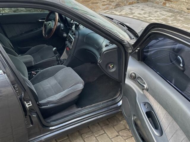 Сірий Альфа 156, об'ємом двигуна 1.7 л та пробігом 250 тис. км за 2600 $, фото 4 на Automoto.ua
