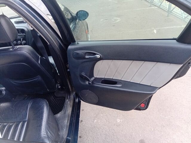 Зеленый Альфа 156, объемом двигателя 1.6 л и пробегом 350 тыс. км за 3500 $, фото 11 на Automoto.ua