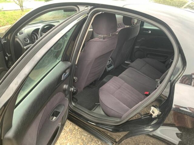 Альфа 159 2006 у Чернівцях на Automoto.ua Чорний Альфа 159, об'ємом двигуна 1.9 л та пробігом 242 тис. км за 7700 $, фото 6 на Automoto.ua