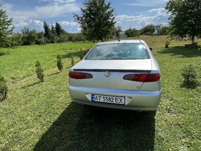 Сірий Альфа 166, об'ємом двигуна 2 л та пробігом 198 тис. км за 2700 $, фото 4 на Automoto.ua