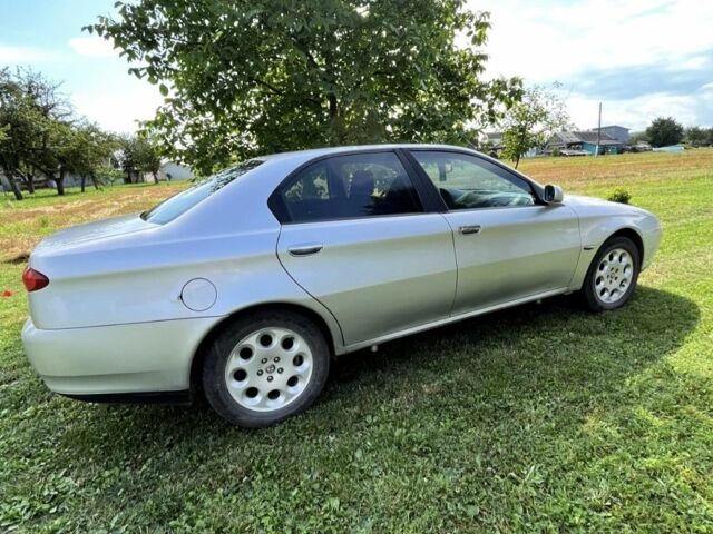 Сірий Альфа 166, об'ємом двигуна 2 л та пробігом 198 тис. км за 2700 $, фото 2 на Automoto.ua