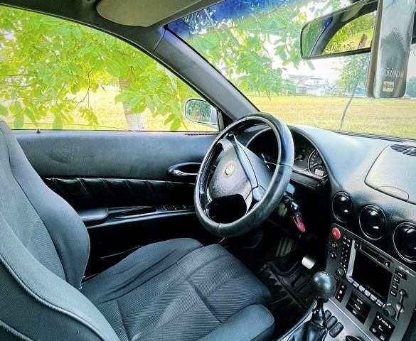 Сірий Альфа 166, об'ємом двигуна 2 л та пробігом 198 тис. км за 2700 $, фото 3 на Automoto.ua