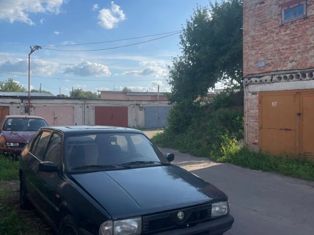 Черный Альфа 33, объемом двигателя 1.7 л и пробегом 285 тыс. км за 800 $, фото 2 на Automoto.ua