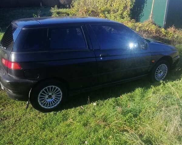 Черный Альфа Ромео 145, объемом двигателя 1.4 л и пробегом 285 тыс. км за 1700 $, фото 4 на Automoto.ua