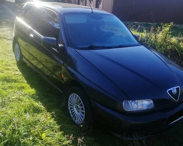 Черный Альфа Ромео 145, объемом двигателя 1.4 л и пробегом 285 тыс. км за 1700 $, фото 3 на Automoto.ua