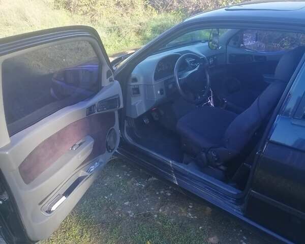 Черный Альфа Ромео 145, объемом двигателя 1.4 л и пробегом 285 тыс. км за 1700 $, фото 2 на Automoto.ua