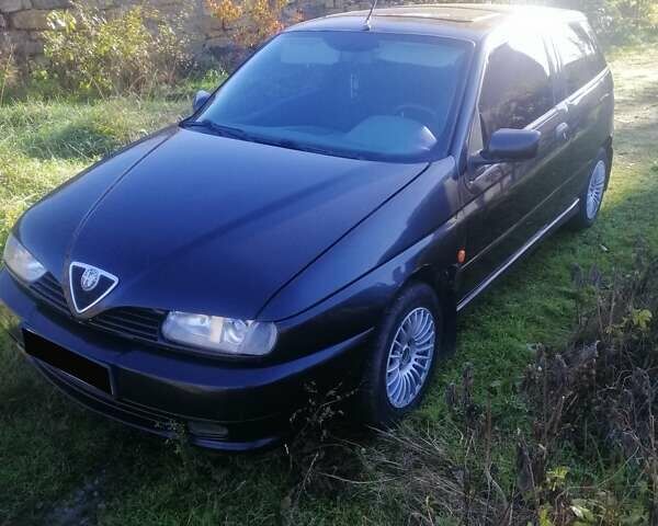 Черный Альфа Ромео 145, объемом двигателя 1.4 л и пробегом 285 тыс. км за 1700 $, фото 6 на Automoto.ua