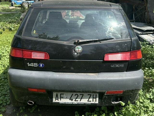 Черный Альфа Ромео 145, объемом двигателя 1.7 л и пробегом 10 тыс. км за 900 $, фото 3 на Automoto.ua