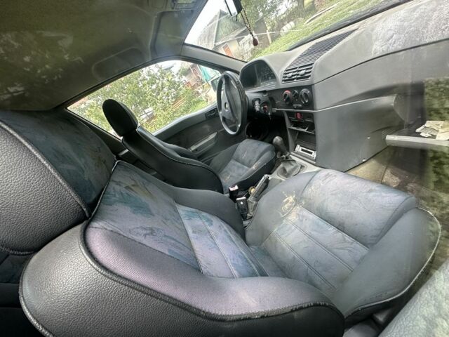 Черный Альфа Ромео 145, объемом двигателя 1.7 л и пробегом 10 тыс. км за 900 $, фото 6 на Automoto.ua