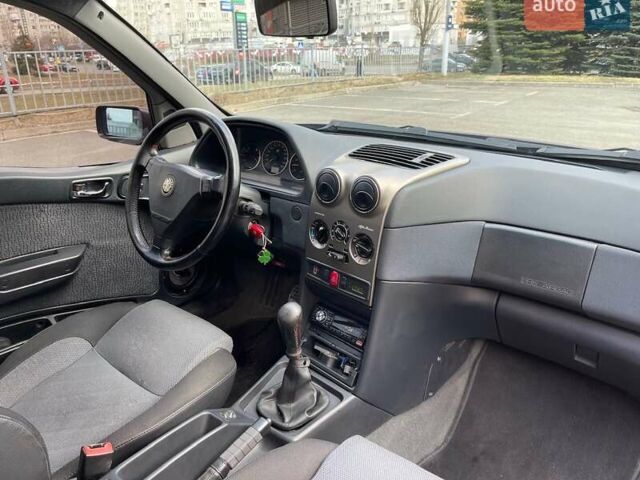 Фіолетовий Альфа Ромео 145, об'ємом двигуна 2 л та пробігом 194 тис. км за 4500 $, фото 39 на Automoto.ua