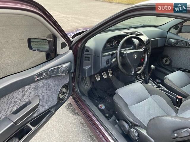 Фіолетовий Альфа Ромео 145, об'ємом двигуна 2 л та пробігом 194 тис. км за 4500 $, фото 11 на Automoto.ua