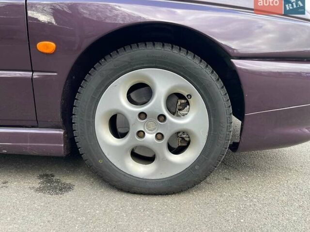 Фіолетовий Альфа Ромео 145, об'ємом двигуна 2 л та пробігом 194 тис. км за 4500 $, фото 1 на Automoto.ua