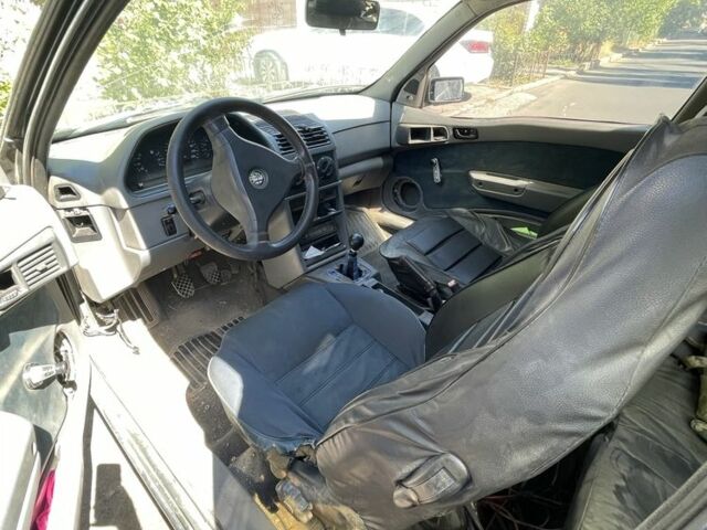 Зелений Альфа Ромео 145, об'ємом двигуна 1.4 л та пробігом 17 тис. км за 1599 $, фото 4 на Automoto.ua