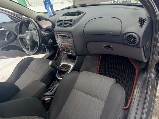 Черный Альфа Ромео 147, объемом двигателя 1.6 л и пробегом 242 тыс. км за 3150 $, фото 18 на Automoto.ua