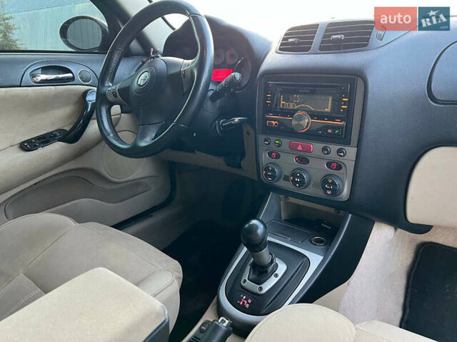 Чорний Альфа Ромео 147, об'ємом двигуна 2 л та пробігом 180 тис. км за 4690 $, фото 37 на Automoto.ua