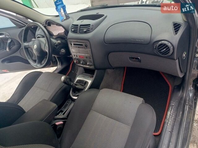 Черный Альфа Ромео 147, объемом двигателя 1.6 л и пробегом 240 тыс. км за 2950 $, фото 20 на Automoto.ua