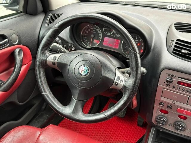 Черный Альфа Ромео 147, объемом двигателя 2 л и пробегом 163 тыс. км за 5990 $, фото 18 на Automoto.ua