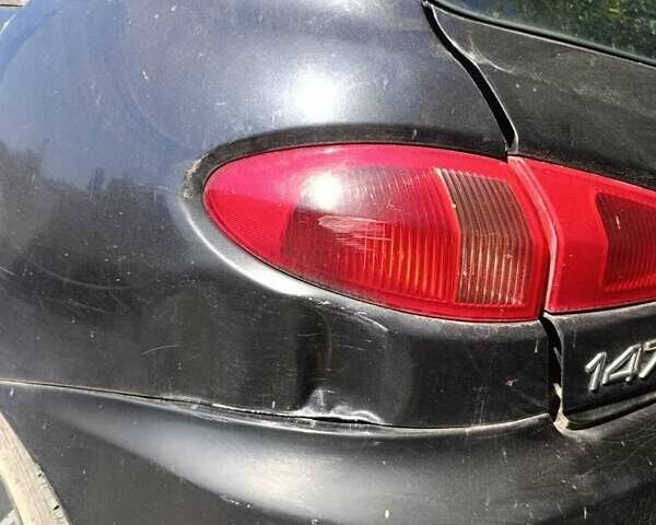 Черный Альфа Ромео 147, объемом двигателя 1.6 л и пробегом 250 тыс. км за 1771 $, фото 5 на Automoto.ua