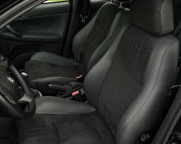 Черный Альфа Ромео 147, объемом двигателя 1.6 л и пробегом 138 тыс. км за 5800 $, фото 23 на Automoto.ua