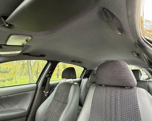 Черный Альфа Ромео 147, объемом двигателя 1.6 л и пробегом 138 тыс. км за 5800 $, фото 93 на Automoto.ua