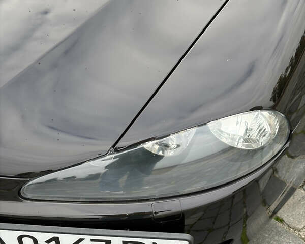 Черный Альфа Ромео 147, объемом двигателя 1.6 л и пробегом 138 тыс. км за 5800 $, фото 59 на Automoto.ua