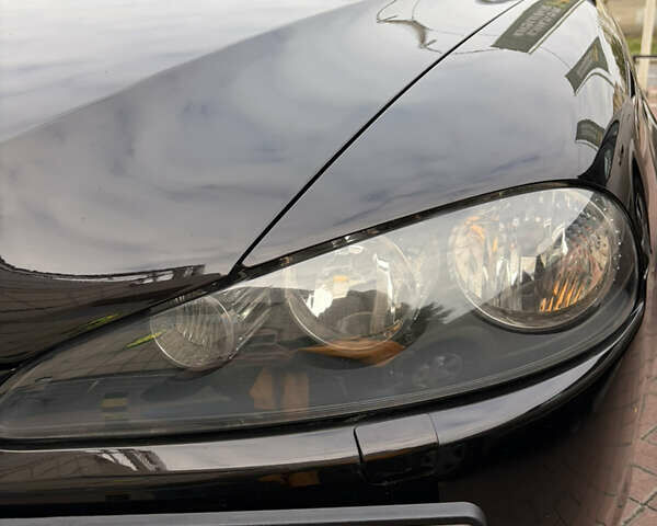 Черный Альфа Ромео 147, объемом двигателя 1.6 л и пробегом 138 тыс. км за 5800 $, фото 148 на Automoto.ua