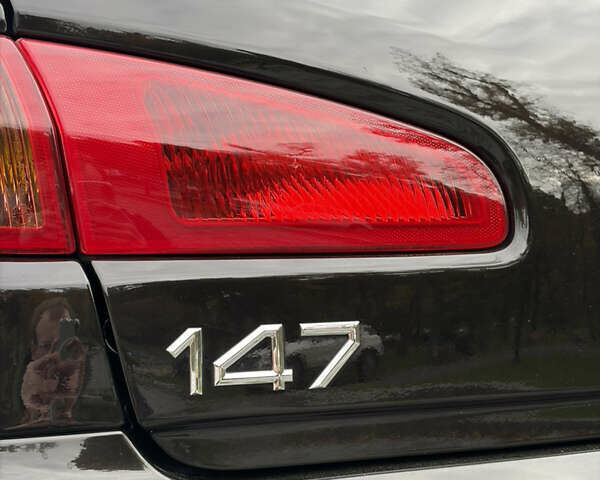 Черный Альфа Ромео 147, объемом двигателя 1.6 л и пробегом 138 тыс. км за 5800 $, фото 107 на Automoto.ua