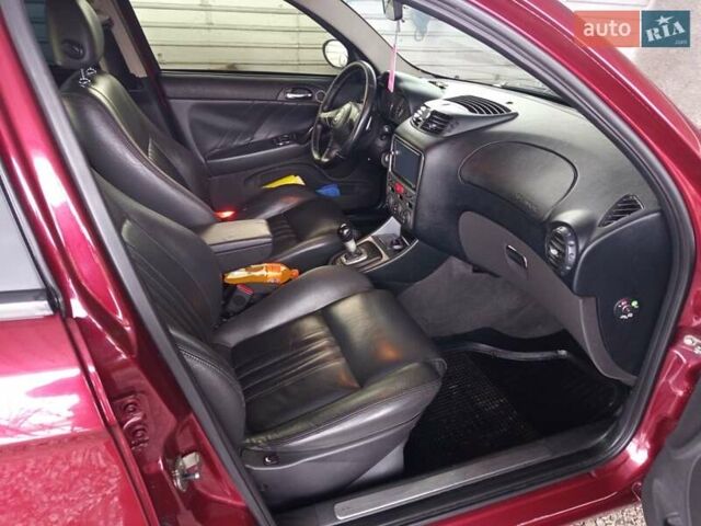 Червоний Альфа Ромео 147, об'ємом двигуна 1.97 л та пробігом 200 тис. км за 5000 $, фото 8 на Automoto.ua