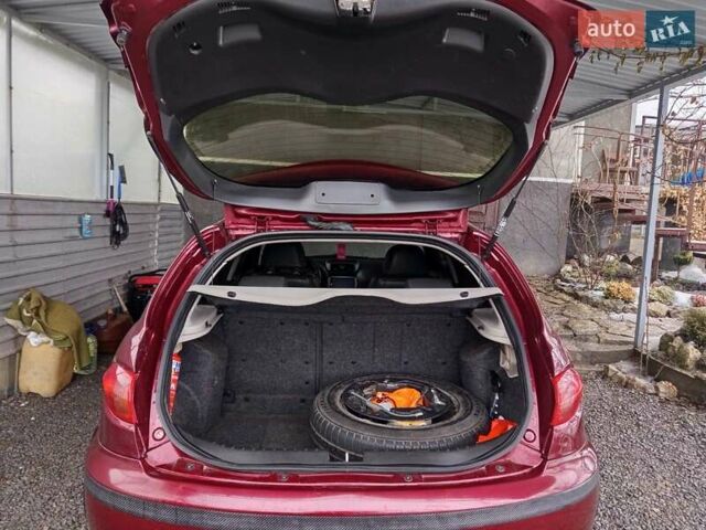 Червоний Альфа Ромео 147, об'ємом двигуна 1.97 л та пробігом 200 тис. км за 5000 $, фото 12 на Automoto.ua