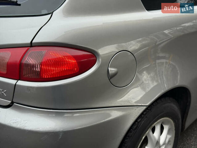 Сірий Альфа Ромео 147, об'ємом двигуна 1.6 л та пробігом 208 тис. км за 3499 $, фото 27 на Automoto.ua