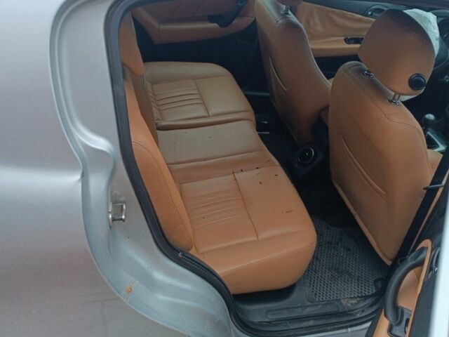 Сірий Альфа Ромео 147, об'ємом двигуна 1.9 л та пробігом 250 тис. км за 1499 $, фото 1 на Automoto.ua