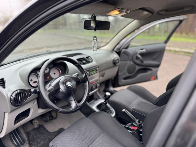 Сірий Альфа Ромео 147, об'ємом двигуна 1.9 л та пробігом 299 тис. км за 1999 $, фото 18 на Automoto.ua