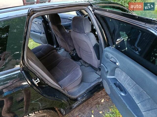 Черный Альфа Ромео 156, объемом двигателя 1.9 л и пробегом 331 тыс. км за 3000 $, фото 7 на Automoto.ua