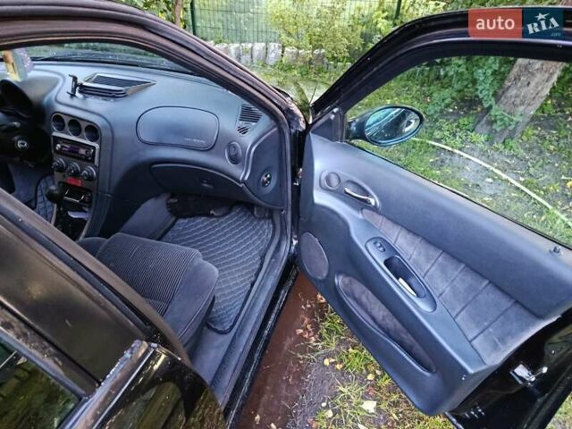 Черный Альфа Ромео 156, объемом двигателя 1.9 л и пробегом 331 тыс. км за 3000 $, фото 4 на Automoto.ua