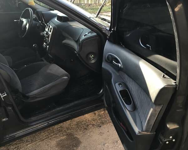 Чорний Альфа Ромео 156, об'ємом двигуна 1.9 л та пробігом 235 тис. км за 1950 $, фото 6 на Automoto.ua