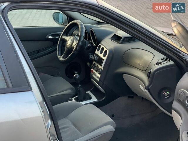 Серый Альфа Ромео 156, объемом двигателя 1.9 л и пробегом 332 тыс. км за 2700 $, фото 25 на Automoto.ua