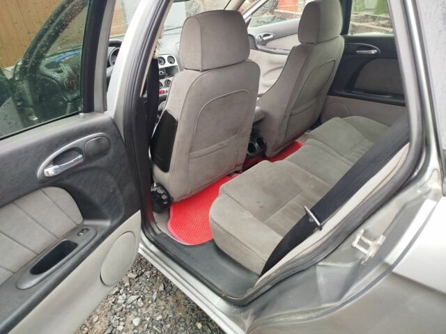 Серый Альфа Ромео 156, объемом двигателя 1.9 л и пробегом 300 тыс. км за 2999 $, фото 16 на Automoto.ua