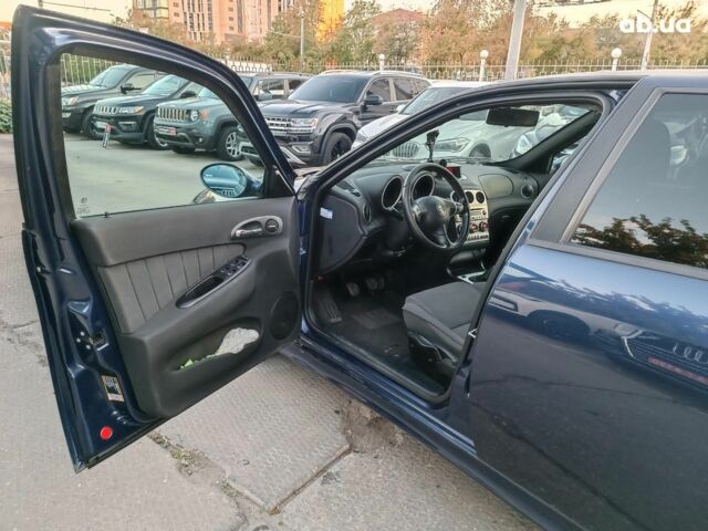 Синий Альфа Ромео 156, объемом двигателя 2 л и пробегом 138 тыс. км за 3890 $, фото 18 на Automoto.ua