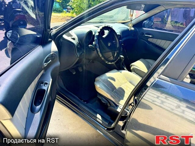 Синий Альфа Ромео 156, объемом двигателя 1.9 л и пробегом 407 тыс. км за 2300 $, фото 8 на Automoto.ua