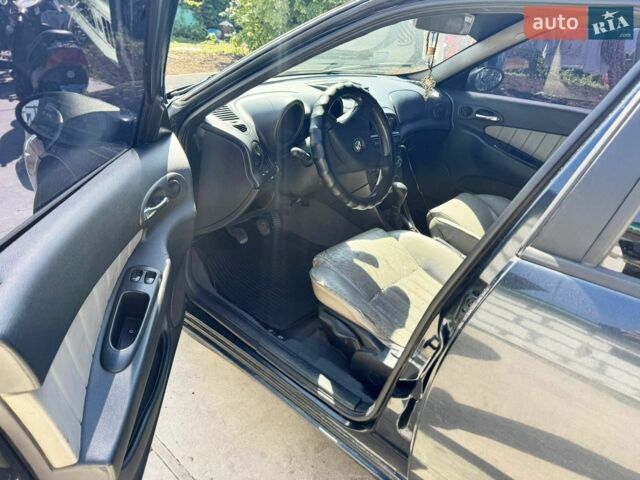 Синій Альфа Ромео 156, об'ємом двигуна 1.91 л та пробігом 407 тис. км за 2300 $, фото 8 на Automoto.ua