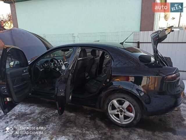 Черный Альфа Ромео 159, объемом двигателя 1.9 л и пробегом 188 тыс. км за 6120 $, фото 12 на Automoto.ua