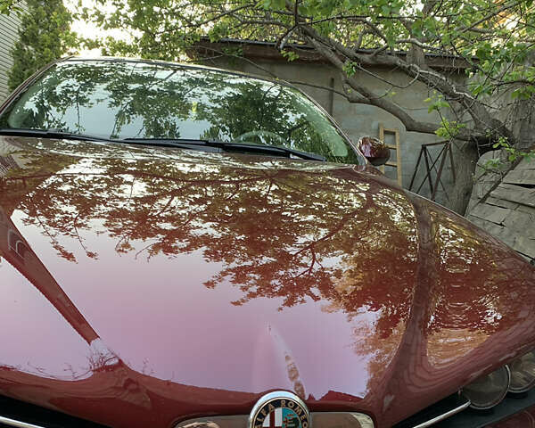 Красный Альфа Ромео 159, объемом двигателя 2.2 л и пробегом 157 тыс. км за 4000 $, фото 2 на Automoto.ua