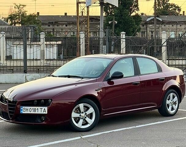Красный Альфа Ромео 159, объемом двигателя 2.2 л и пробегом 168 тыс. км за 6600 $, фото 1 на Automoto.ua