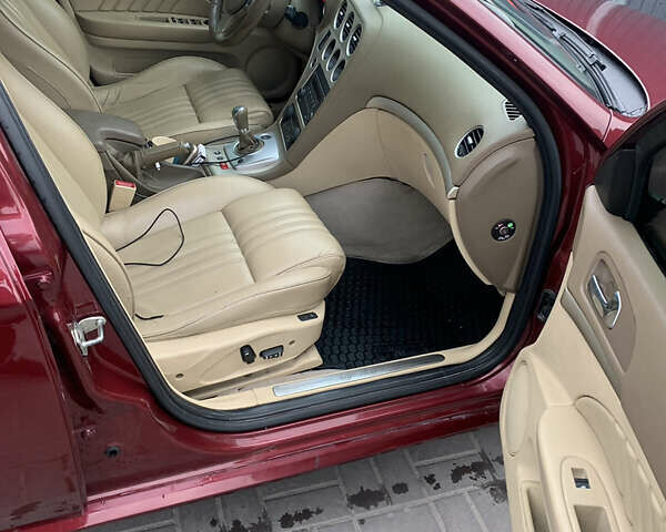 Красный Альфа Ромео 159, объемом двигателя 2.2 л и пробегом 157 тыс. км за 4000 $, фото 25 на Automoto.ua