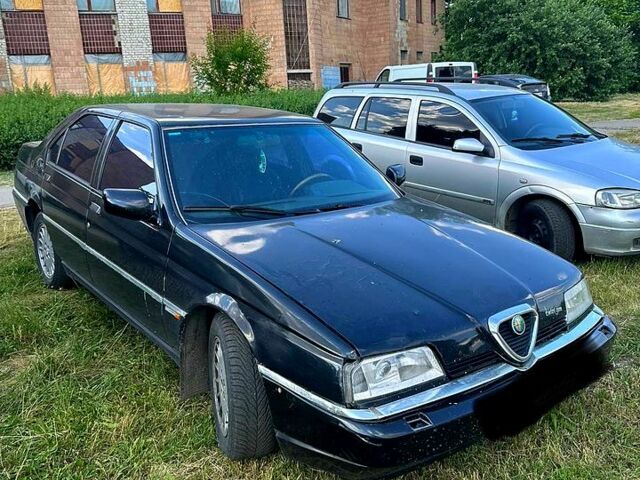 Черный Альфа Ромео 164, объемом двигателя 3 л и пробегом 400 тыс. км за 1950 $, фото 1 на Automoto.ua