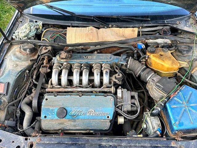 Черный Альфа Ромео 164, объемом двигателя 3 л и пробегом 400 тыс. км за 1950 $, фото 4 на Automoto.ua