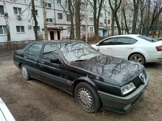 Черный Альфа Ромео 164, объемом двигателя 2 л и пробегом 300 тыс. км за 1050 $, фото 1 на Automoto.ua