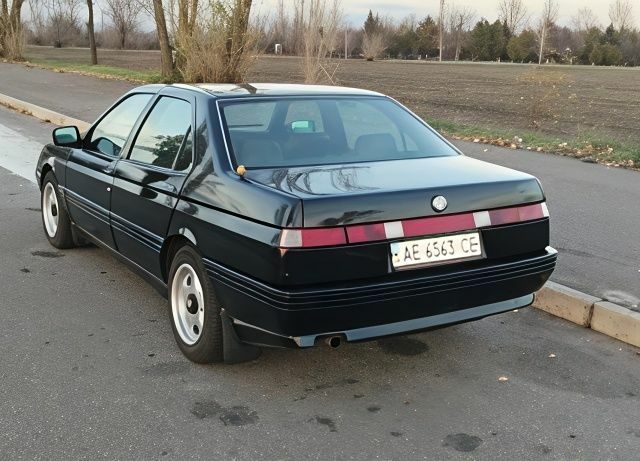 Черный Альфа Ромео 164, объемом двигателя 2 л и пробегом 480 тыс. км за 1200 $, фото 1 на Automoto.ua